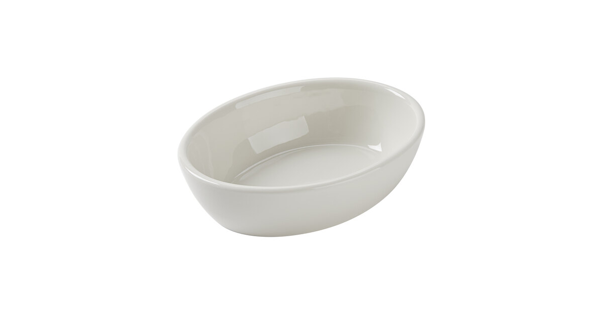 Tuxton BEK-160 16 oz. Eggshell Oval China Baker Dish / Bowl - 12/Case