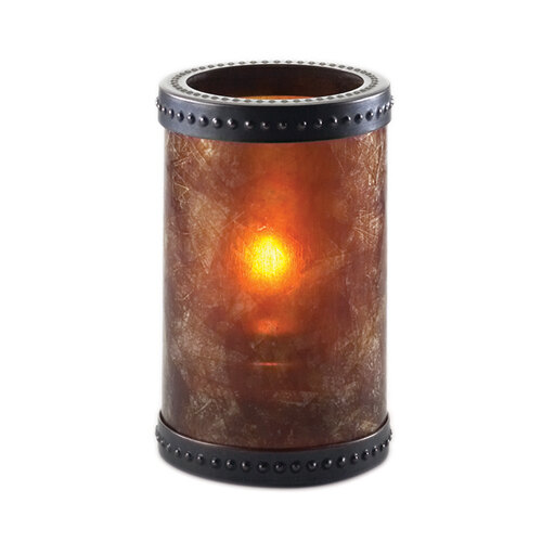 A Sterno mica liquid candle holder with bronze accent rings and a lit candle inside.