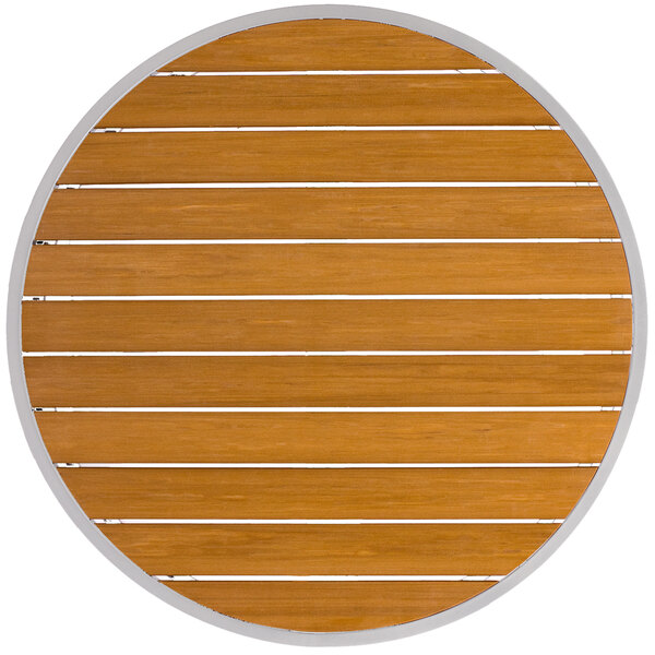 A circular wood surface with white trim.