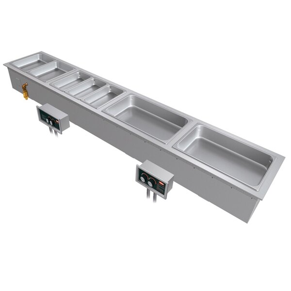 A silver rectangular Hatco drop-in hot food well with three compartments.