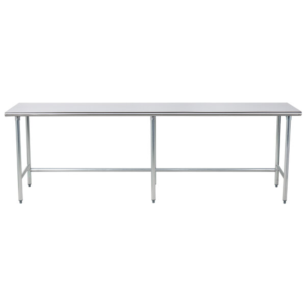 A long metal Advance Tabco work table with an open base.