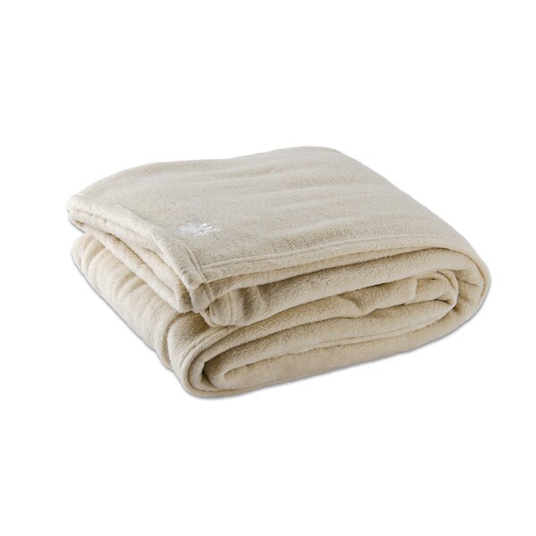 A folded Oxford king size vanilla fleece blanket on a white background.