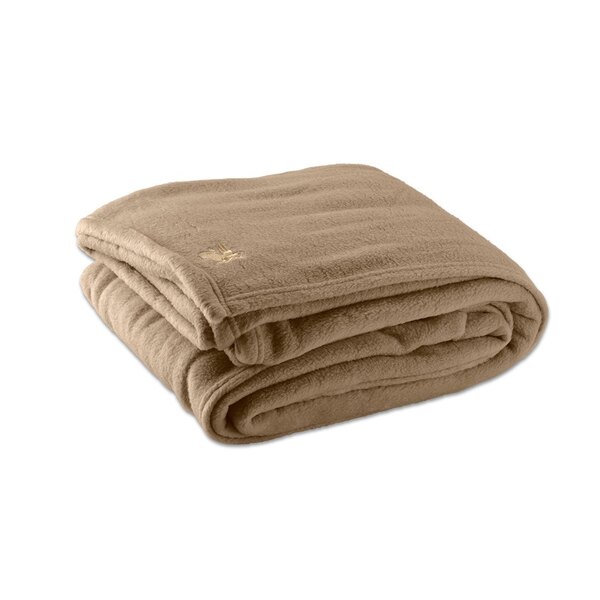 A folded desert tan Oxford king size fleece blanket.