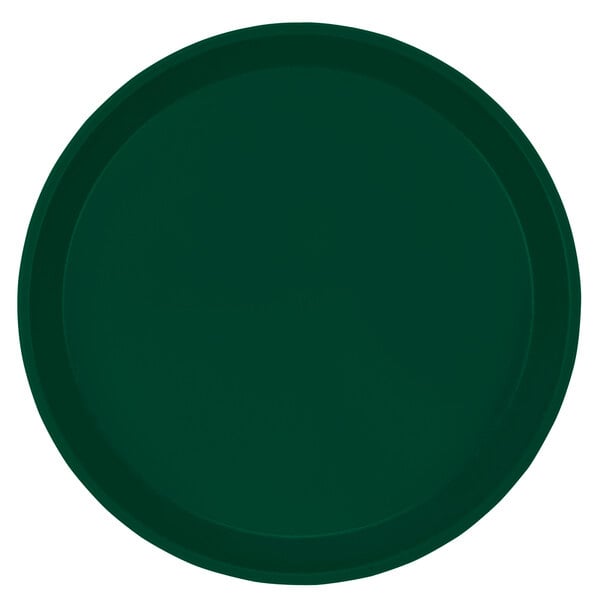 A green round Cambro tray with a white border.