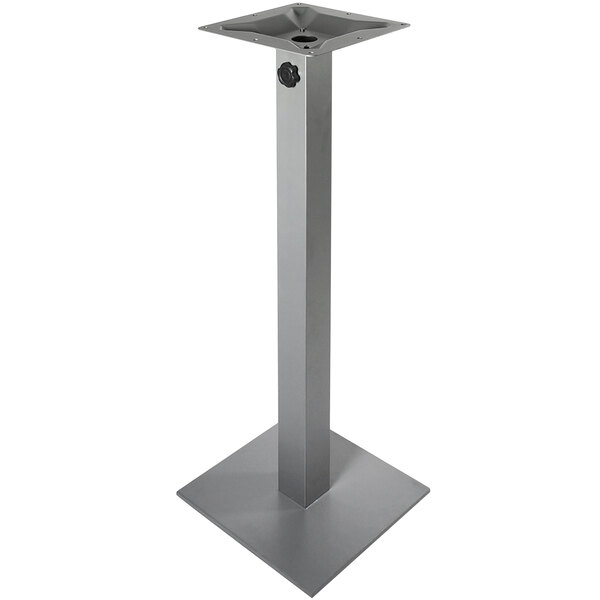 A silver metal BFM Seating Margate square table base with a black umbrella hole.