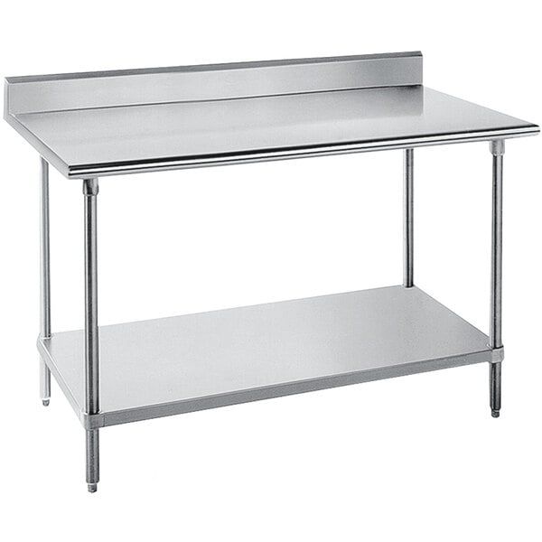 An Advance Tabco stainless steel work table with undershelf and backsplash on a counter.
