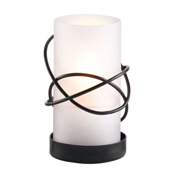 A Sterno Atomic black lamp base with a white candle and black wire around it.