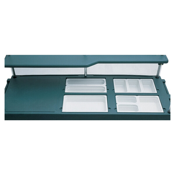 A green plastic Cambro tray top with four rectangular compartments.