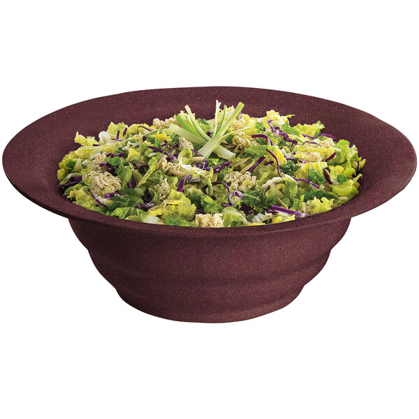 A Tablecraft maroon speckle salad bowl filled with salad and vegetables.