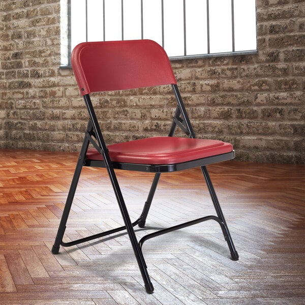 National Public Seating 818 Black Metal Folding Chair with Burgundy Plastic Seat