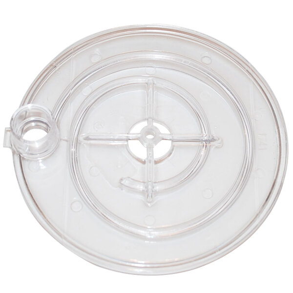 A clear plastic cover with a circular hole.