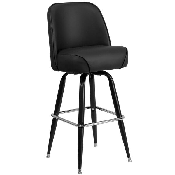 A Flash Furniture black metal barstool with chrome legs and a black padded vinyl swivel seat.