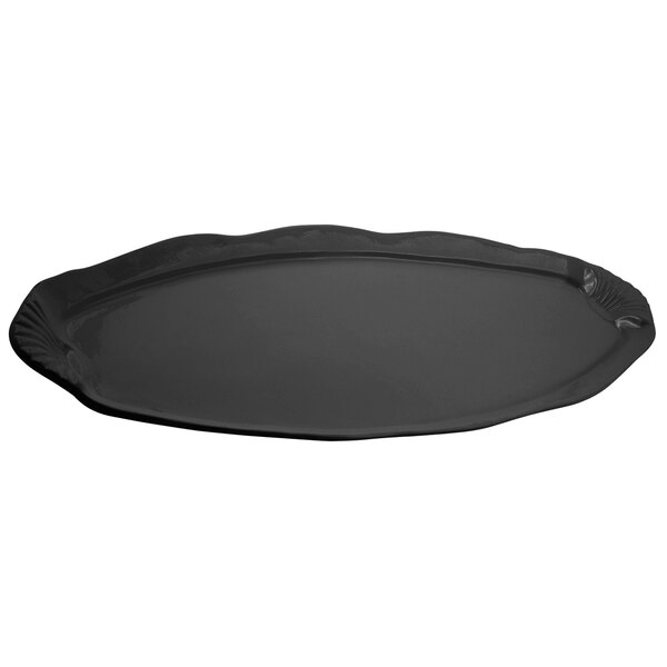 A black oval cast aluminum platter with a scalloped edge.