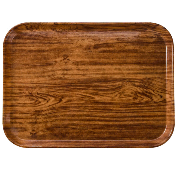 A rectangular Java teak fiberglass Cambro tray with a dark wood finish.
