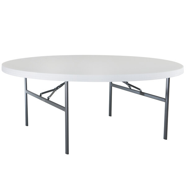 A white Lifetime round table with metal legs.