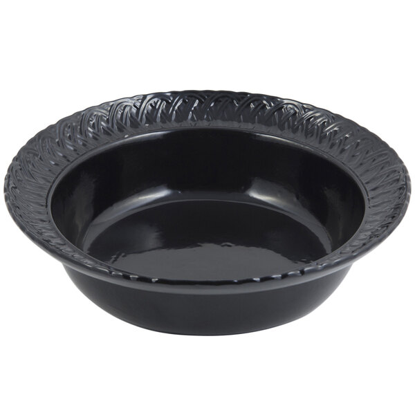A black Bon Chef cast aluminum bowl with a decorative trellis design.