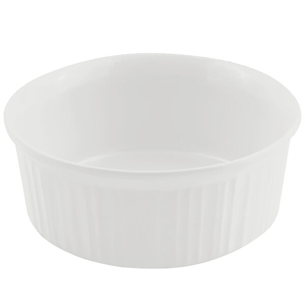 A white Bon Chef cast aluminum casserole dish with a lid on a white surface.