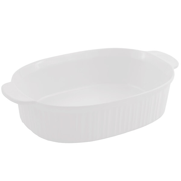 A white Bon Chef oval casserole dish with a lid.