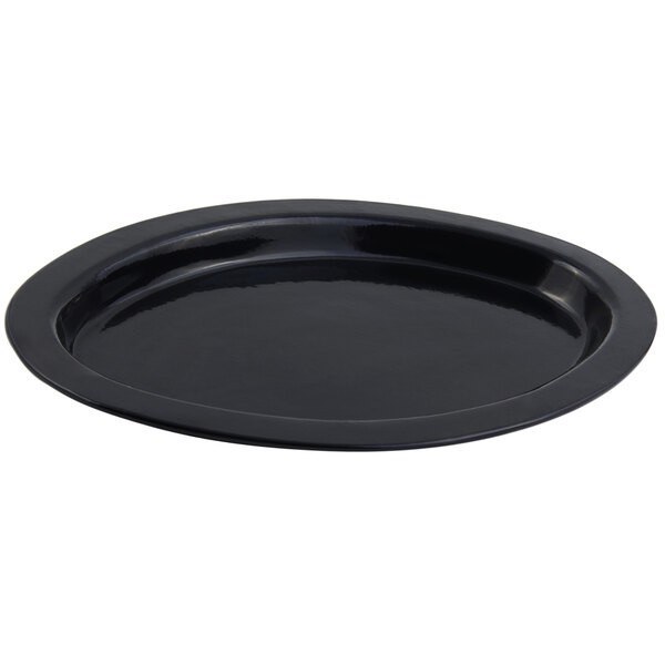 A black oval Bon Chef cast aluminum casserole dish with a sandstone finish.
