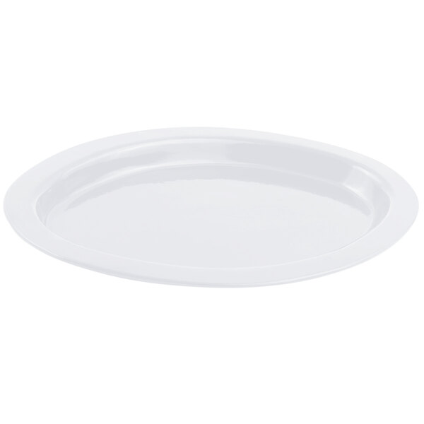 A white Bon Chef oval casserole dish with a circular object in the middle.