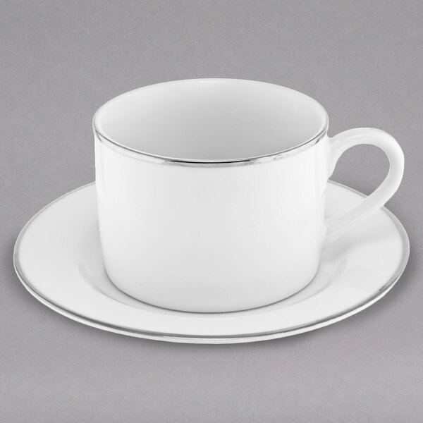 A 10 Strawberry Street Silver Line white porcelain cup and saucer.