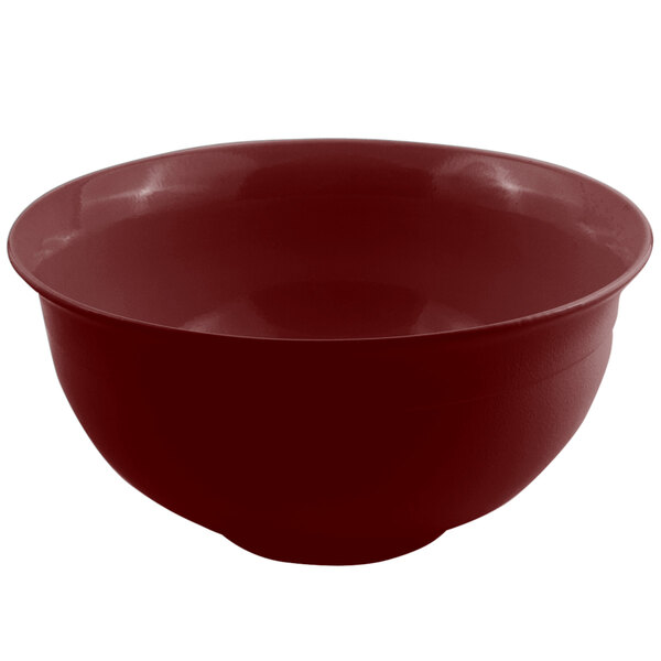 A terra cotta sandstone finish cast aluminum tulip bowl with a red surface and white border.