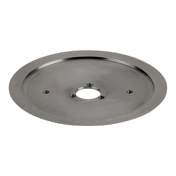 A circular metal blade with a hole in the center.