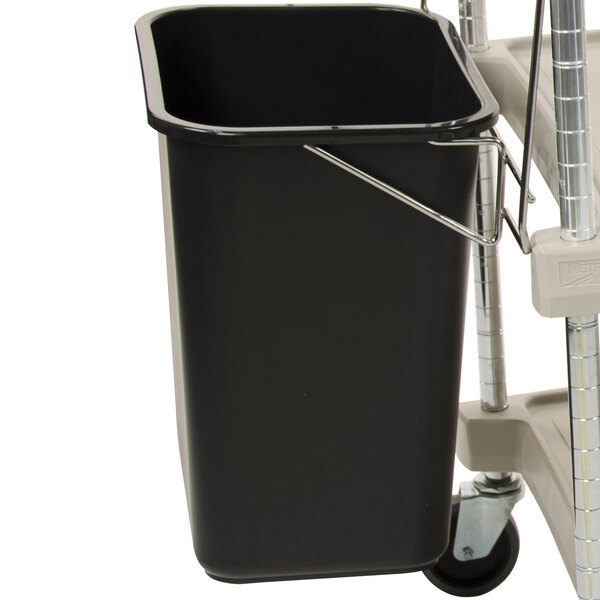A black plastic bin on a white cart.