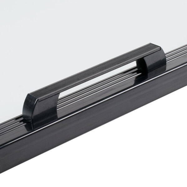 A black metal rectangular refrigerator door with a handle.