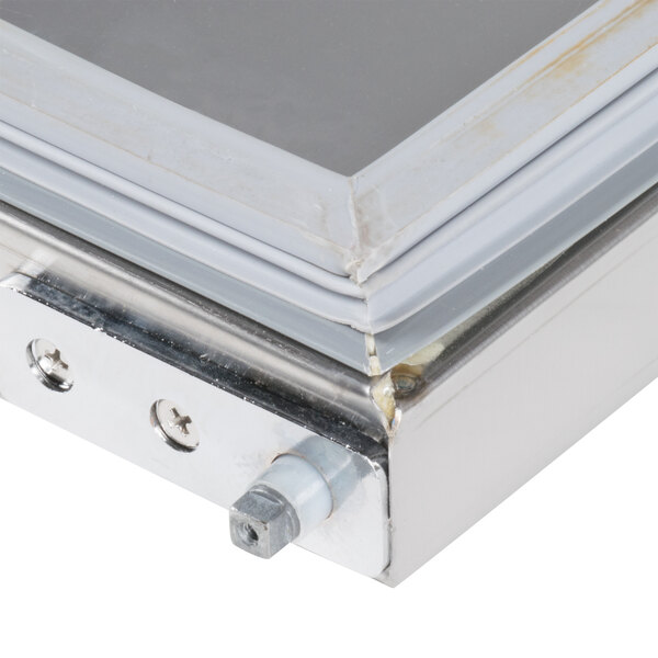 A close up of the left hinged solid metal door for an Avantco refrigeration unit.