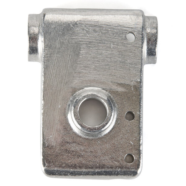 A metal half housing for a juicer with a hole in the center.