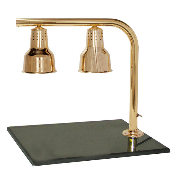 A Hanson Heat Lamps brass carving station with two lamps over a black granite surface.