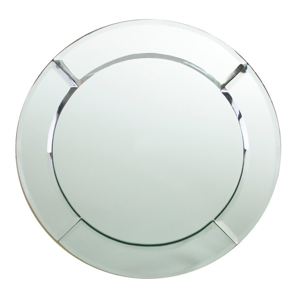 A Charge It by Jay circular glass plate with a silver rim.