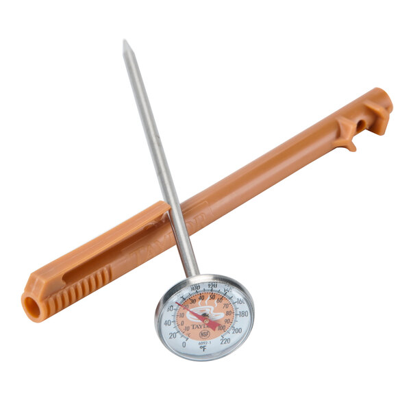 A Taylor pocket probe dial thermometer with a brown wooden handle.
