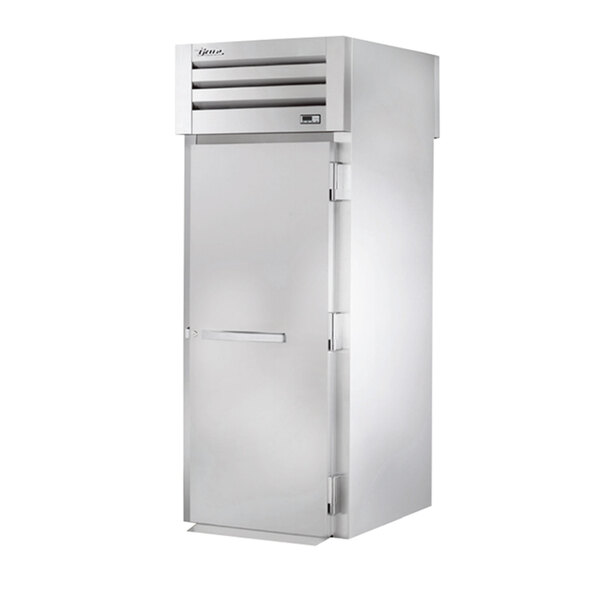 A stainless steel True roll-through holding cabinet with a solid door.