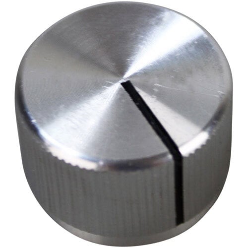 A close-up of a silver metal oven knob with a black pointer.