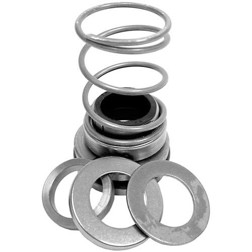 A set of metal washers and springs on a table.