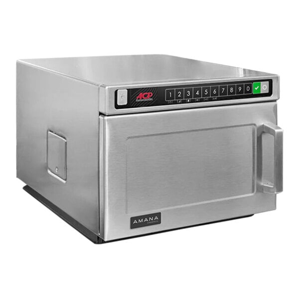 An Amana stainless steel commercial microwave on a white background.