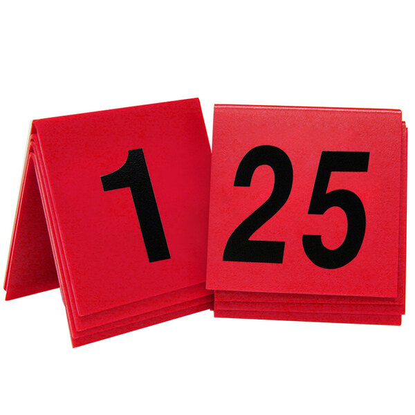 Two red Cal-Mil table tents with black numbers on a white background.