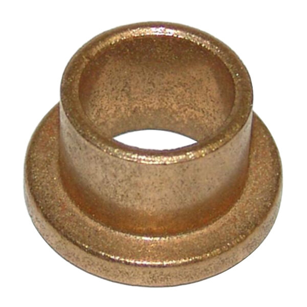 A close-up of a bronze bushing with a hole in it.