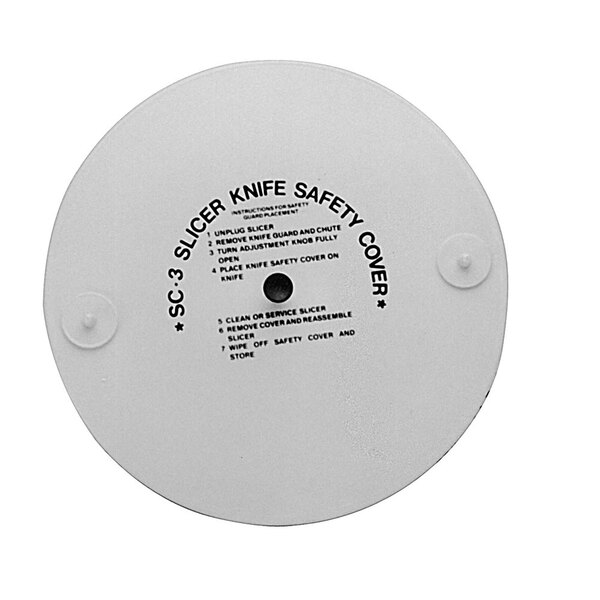 A white plastic cover with black text for circular knife blades.