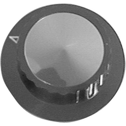 A close-up of a black circular thermostat knob with a silver dial.