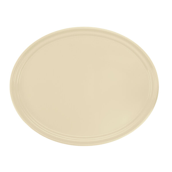 A yellow oval Cambro tray with a white border.