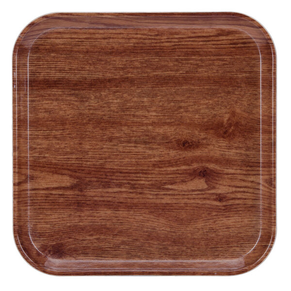 A square Cambro fiberglass tray with a Country Oak finish.