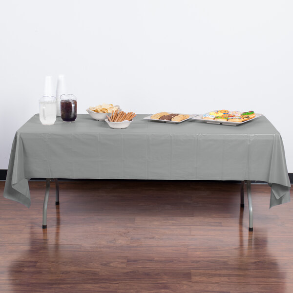 Creative Converting 01203B 54" x 108" Shimmering Silver Disposable Plastic Table Cover - 24/Case