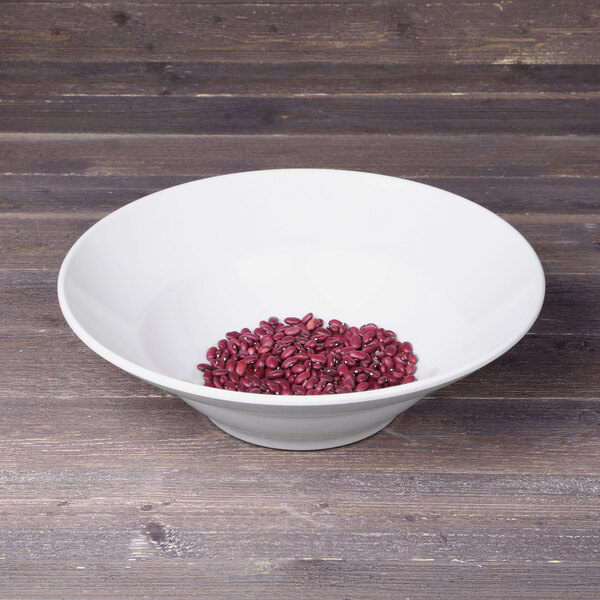 A white Elite Global Solutions Patriarch melamine bowl filled with red beans.
