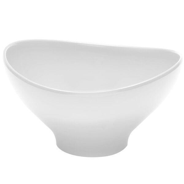 An Elite Global Solutions white melamine oval bowl with a curved edge.