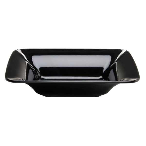 A black rectangular flared bowl by Elite Global Solutions on a counter.