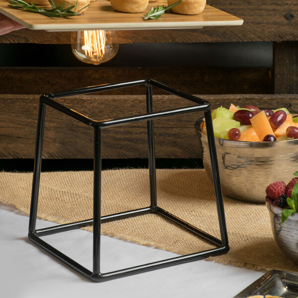 A metal stand with food on it.