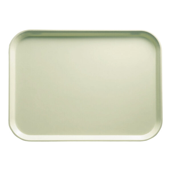 A white rectangular Cambro tray with a green border.